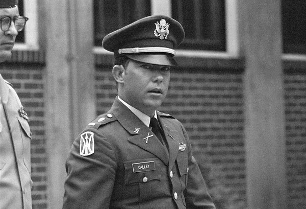 Lt. William L. Calley, Jr. looks at the camera. He is wearing his Army uniform, including a hat.